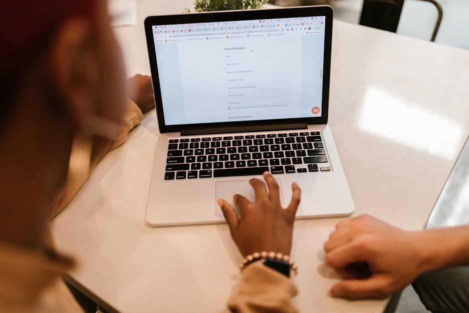 Employee benefits enrollment form on a laptop screen