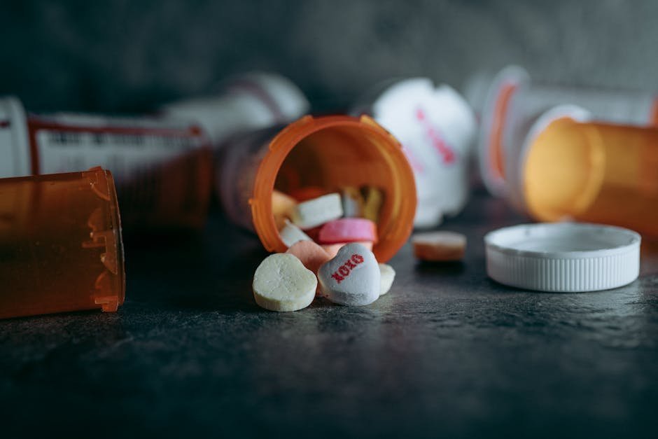 Various pill bottles representing medications that can induce mood disorder