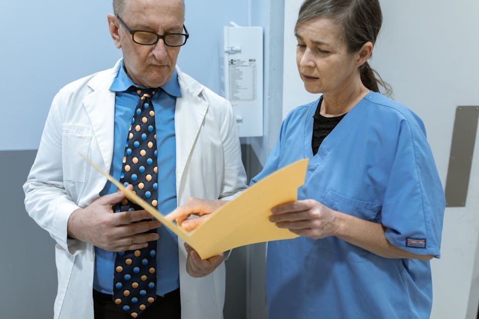 Geriatric psychiatric nurse reviewing medication list with older adult patient