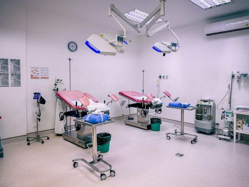 Hospital room set up with adult bed and bassinet for joint mother baby admission