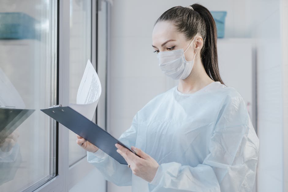 Dietitian and nurse reviewing slow refeeding meal plan and electrolyte chart at bedside