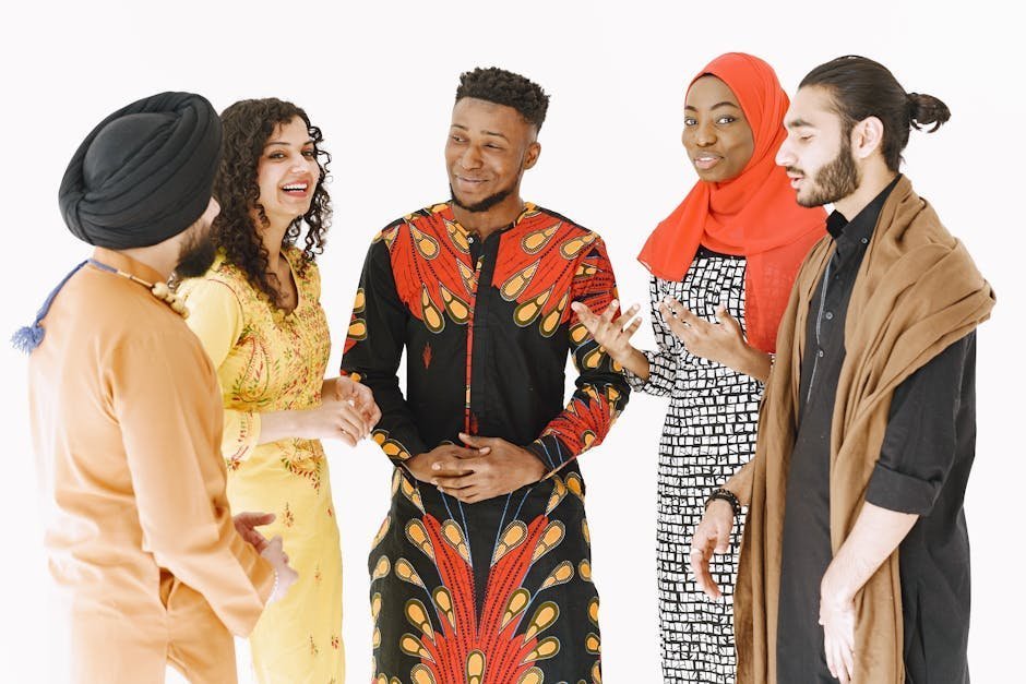 Diverse group of adults at community gathering inside lit interior space, building genuine connections